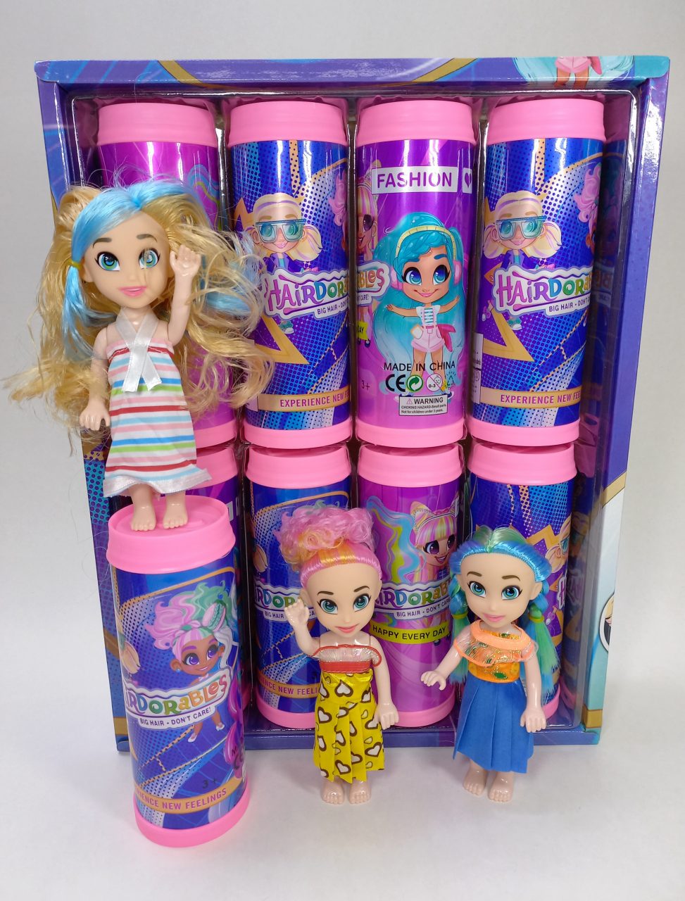 Muñeca HairDorables Sorpresa formato tubo