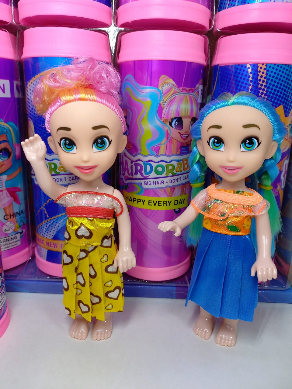 Muñeca HairDorables Sorpresa formato tubo